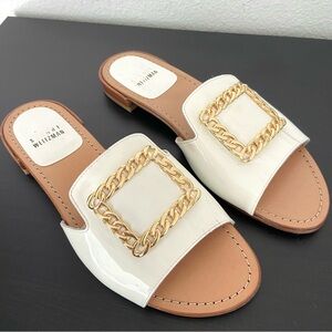 Stuart Weitzman Jacqui Gold Chain Buckle Flat Slide Sandals